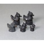 Graduated set five bronze opium weights