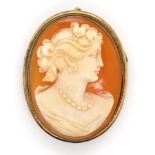 Carved cameo and silver gilt brooch