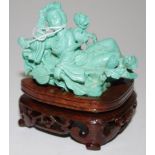 Chinese turquoise coloured figure on stand