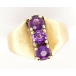 Amethyst and 9ct gold three stone ring