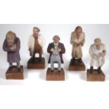 Five Black Forest carved wood figures