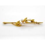 9ct yellow gold and pearl set brooch