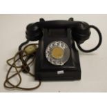 Vintage black Bakelite rotary dial telephone