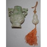Chinese green stone snuff bottle and toggle