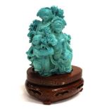 Chinese turquoise coloured figures group on stand