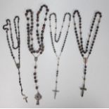 Four various vintage rosary beads