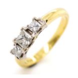 Three stone diamond and 18ct gold ring