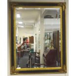 Gilt framed wall mirror