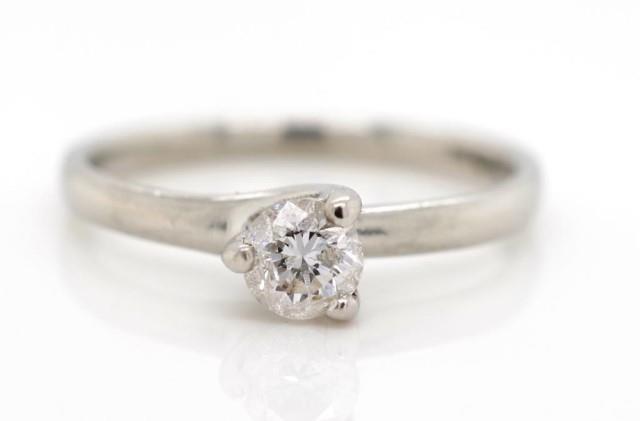 Diamond solitaire and platinum ring