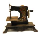 Child's vintage toy sewing machine