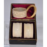 Pair of cased ivory napkin rings