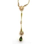 Tourmaline set hanging gold pendant