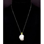 Baroque pearl, peridot and 10ct white gold chain