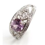 18ct white gold, diamond and purple gemstone