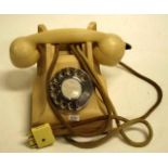 Vintage beige Bakelite rotary dial telephone