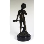 Vintage bronzed standing boy figure