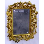 Ornate grape gilt framed mirror
