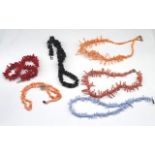 Six coral necklaces