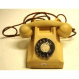 Vintage beige Bakelite rotary dial telephone