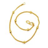 24ct Gold curb link and ball bracelet