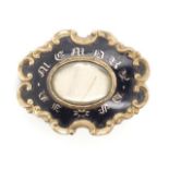 Victorian enamel and gold backed mourning brooch