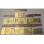 Ten Australian "gold" souvenir banknotes