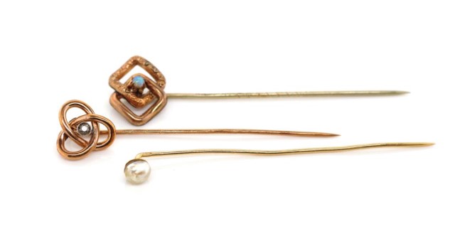 Two antique gold and gemstone stick pins