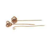 Two antique gold and gemstone stick pins