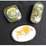 Three decorated Russian lacquer trinket boxes