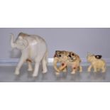 Three vintage ivory figures of elephants