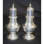 Pair George V sterling silver pepperettes