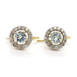 Aquamarine and diamond halo earrings