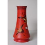 Shelley red vase decorated with cranes.