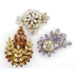 Three Jewel Crest brooches