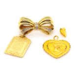 Diamond bow brooch and two gold charms