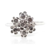 Diamond set 18ct white gold flower ring