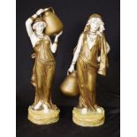 Pair Theodore Schoop ceramic water carrier figures