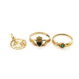 Two 9ct gold rings and a gold charm