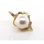 14ct yellow gold, diamond and Mabe pearl pendant