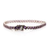 Amethyst set sterling silver tennis bracelet