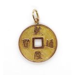 Oriental gold pendant
