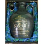 Boxed stoneware decanter of QEII Whisky