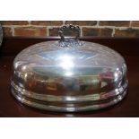 Enormous silver plate meat dome