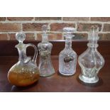 Four vintage and antique glass decanters