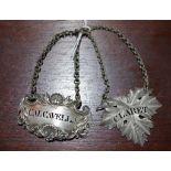 Two antique silver wine labels