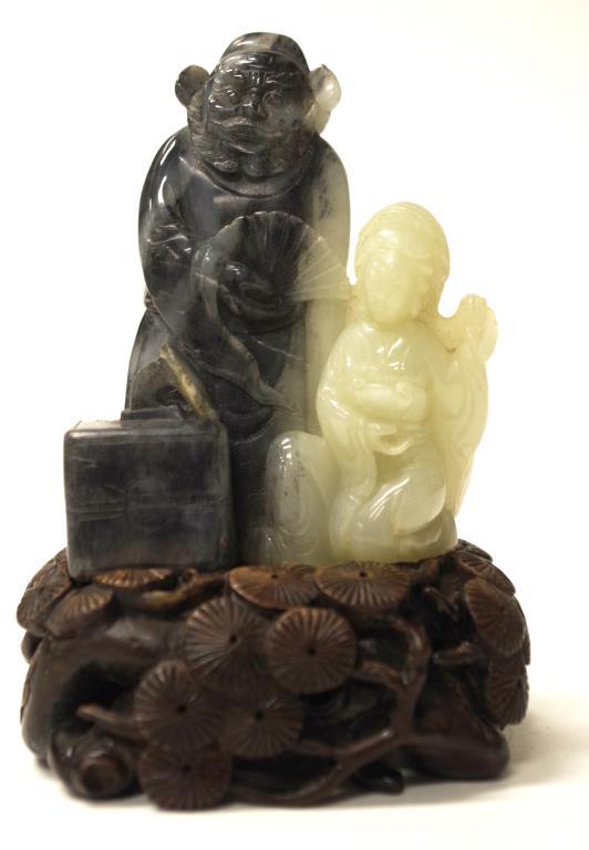 Chinese carved blue & white jade figure & stand