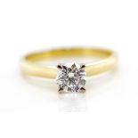 Solitaire diamond and 18ct yellow gold ring