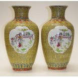 Pair of Chinese yellow ground famille rose vases