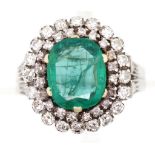 Emerald and diamond double halo ring
