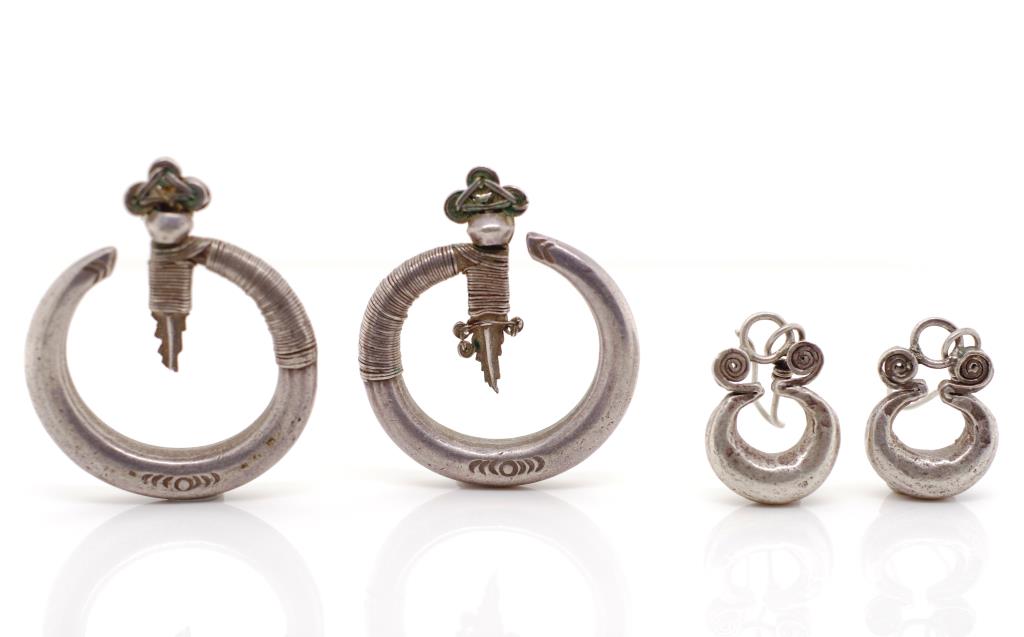 Two pairs of Central Asian tribal silver earrings